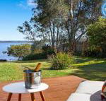 Braeside waterfront fireplace - Accommodation Redcliffe