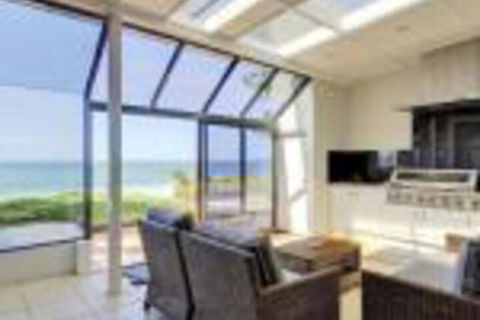Whispering Sands 10 Sandy Point Road Luxury Waterfront Home With Aircon WIFI & Foxtel - Accommodation Redcliffe 0