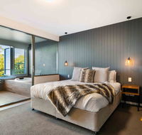 Luxury Spa Retreat with Ocean and Hinterland Views - Accommodation Redcliffe