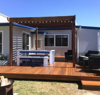 Shellharbour Beach Cottage - walk onto Patrolled beach with flags in summer - Accommodation Redcliffe