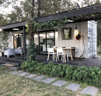 Absolute riverfront shipping container cabin - Accommodation Redcliffe